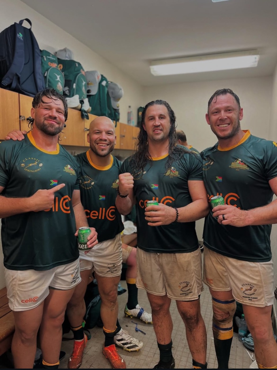 Sam Barton with Classic Springboks teammates, including Kobus van Wyk and Morgan Newman, in the changing room in Bermuda.